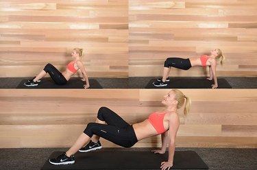 Woman performing crab walk ab exercise.