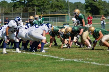 photo of football players starting to play a football game