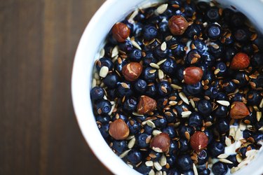 Blueberries, hazelnuts, flax and sunflower seeds breakfast