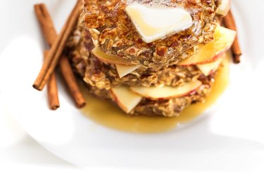 Apple-Cinnamon Protein Pancakes on a white plate