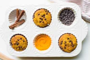 Golden Glow Turmeric Flourless Muffins in a muffin tin