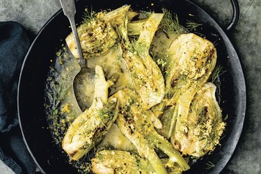 Citrus and garlic-herb braised fennel on a pan