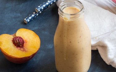 Peaches and Cream Protein Smoothie in a Glass Jar