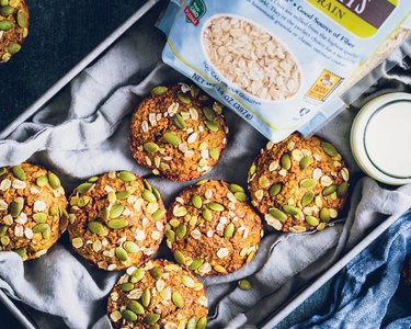 Pumpkin muffins made with rolled oats, studded with pumpkin seeds