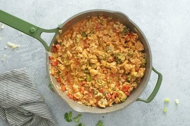 Buffalo chicken casserole filling in a pan