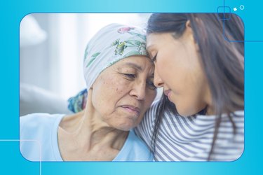 a person with cancer wearing a headscarf embracing their daughter who is acting as a caregiver