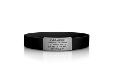An image of a black silicone bracelet with a silver clasp attached with contact information.