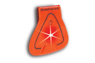An image of a bright orange mini reflector with a flashing red light.