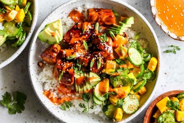 Salmon Sushi Bowls on a marble table