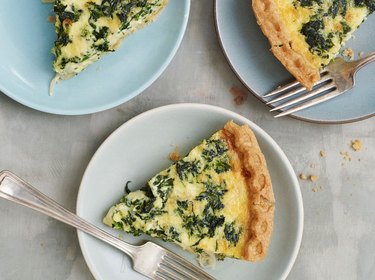 Spinach Quiche slices on plates