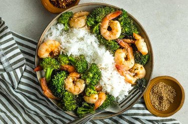 Sheet Pan Honey Garlic Shrimp and Broccoli in a bowl on a table