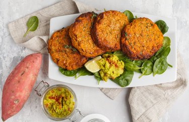 Sweet Potato Sliders With Guacamole on a bed of greens