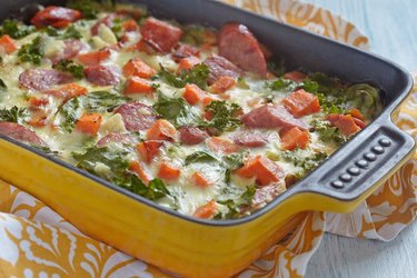 Sweet potato and sausage breakfast casserole in a yellow dish