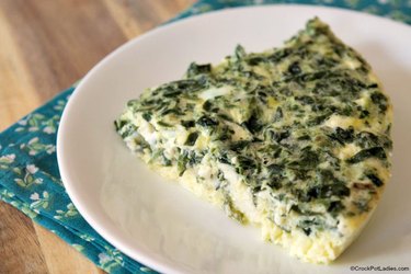 Crock-Pot Crustless spinach and feta quiche on a white plate
