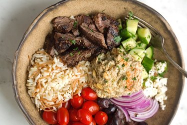 Beef Shawarma Bowls with Vermicelli Rice in rustic bowl on marble table
