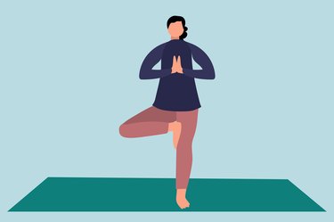 Illustration of Person Doing Tree Pose on a Yoga Mat