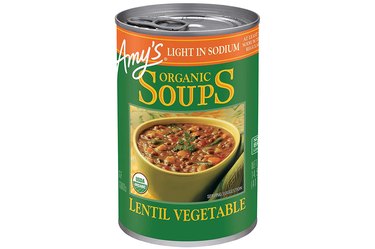 A green can of Amy's organic lentil vegetable soup