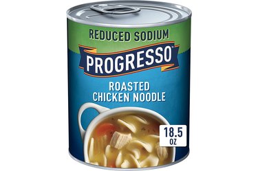 A blue and green can of Progresso roasted chicken noodle soup