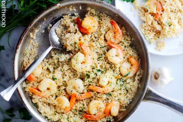 Garlic Butter Shrimp and Rice in a pot on countertop.