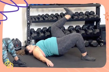 Personal trainer doing a single-leg glute bridge during full-body body-weight strength workout