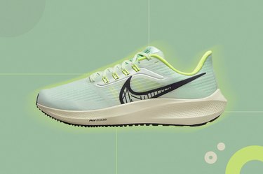 Green Nike Pegasus 39 shoes on a green background
