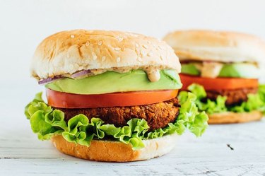 two tempeh veggie burgers made with nutritional yeast