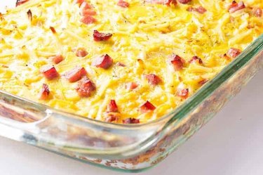Easy Breakfast Casserole has hash browns, ham, cheese, and eggs