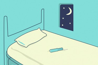 illustration of a tampon on a bed, to represent wearing a tampon to bed