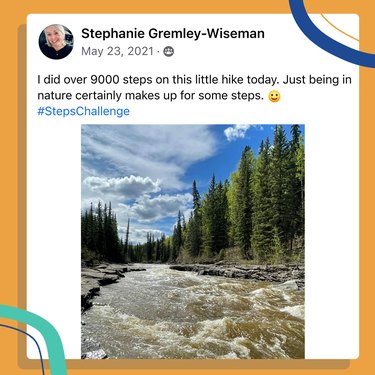 a square screenshot of an encouraging comment from the LIVESTRONG.com Challenge Facebook Group reading "I did over 9,000 steps on this little hike today. Just being in nature certainly makes up for some steps" accompanied by a photo of a stream and pine trees