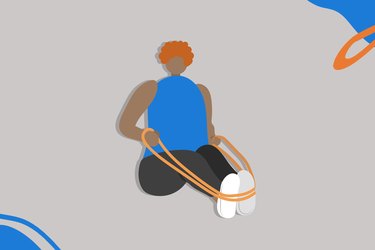 Person doing the seated row exercise during a resistance band challenge