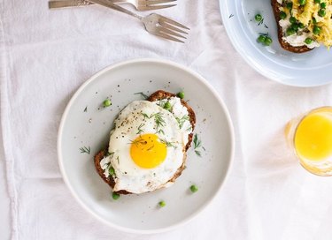Simple Goat Cheese and Egg Toasts With Fresh Peas and Dill