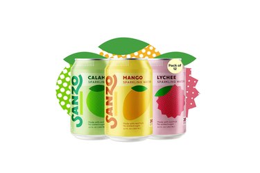 sanzo calamansi, mago and lychee sparking water cans on a white background
