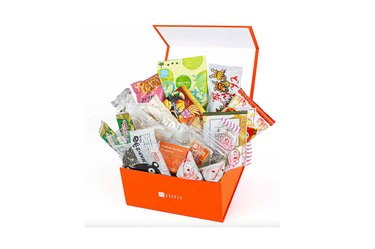 box of bokksu japanese snacks on a white background