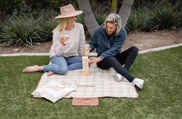 two women outdoors sipping on Zevia Creamy Root Beer