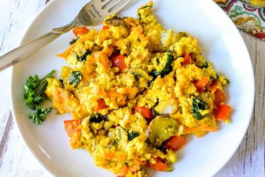 vegan breakfast casserole made with tofu on a white plate as a healthy plant protein breakfast recipe