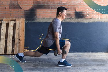 Man doing a forward lunge with dumbbells for the 30-day dumbbell challenge