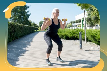 person doing dumbbell squat outside as part of 30-day dumbbell challenge