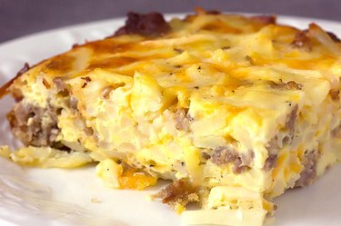 High Protein Sausage Hash Brown Breakfast Casserole on a white plate