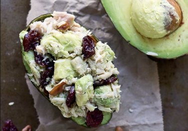 This tuna salad-stuffed avocado recipe includes dried cherries, nuts and half an avocado