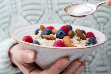 image of bowl of oatmeal wiht almonds and berries