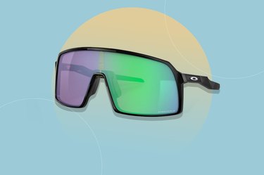 Image of a pair of Oakley Sutro sunglasses on a light blue background.