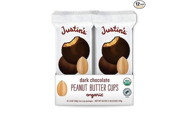 Justin's dark choc.olate peanut butter cups on a white background