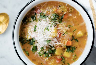 Slow cooker winter vegetable soup with red lentils, perfect for a sore throat