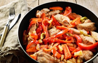 Baja Chicken and Pepper “Pasta” stir-fry in a skillet with a fork and knife