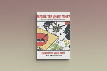 Feeding the Whole Family by Cynthia Lair, against a gray background