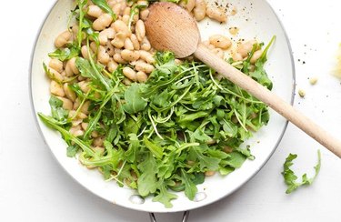 Zesty White Bean and Arugula Salad in a white plate