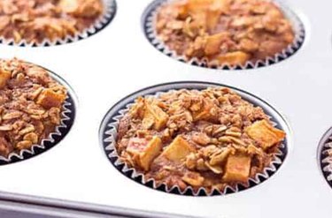 Apple Cinnamon Baked Oatmeal Muffins in a metal tin