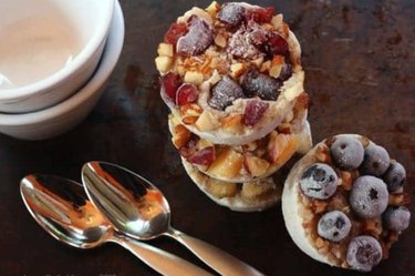 Freezer Oatmeal Cups with white bowls and silver spoons