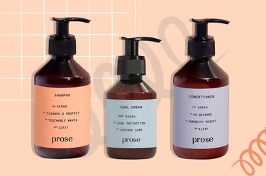 Prose brand customized shampoo, curl cream and conditioner bottles with pumps on coral background