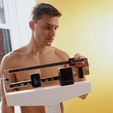 Man Weighing Himself